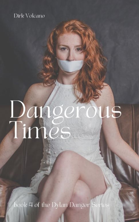 Book cover for Dangerous Times, the fourth book in the Dylan Danger Series by Dirk Volcano. The image shows a red-haired woman in a white lace dress sitting on a leather couch with tape over her mouth, against a gray background. The title and author's name are displayed in elegant white serif fonts.